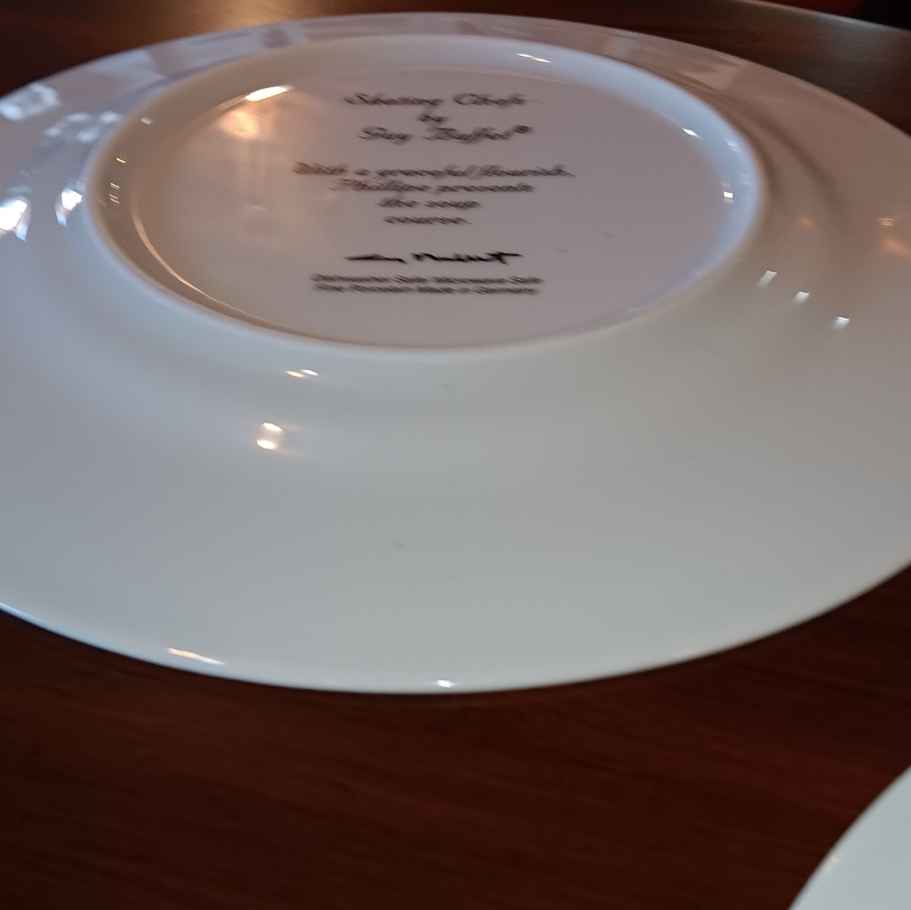 Porcelain Plates, Skating Chefs By Guy Buffett.